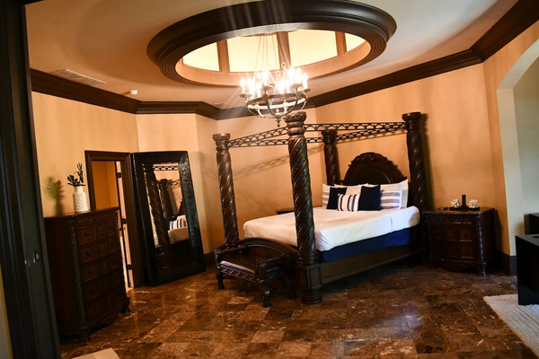 Master bedroom with a private en suite bathroom for added convenience and privacy. With marble floors, California king custom built bedroom suite, A bathroom with double vanity, jacuzzi tub and ultimate spa like experience with luxury marble shower.