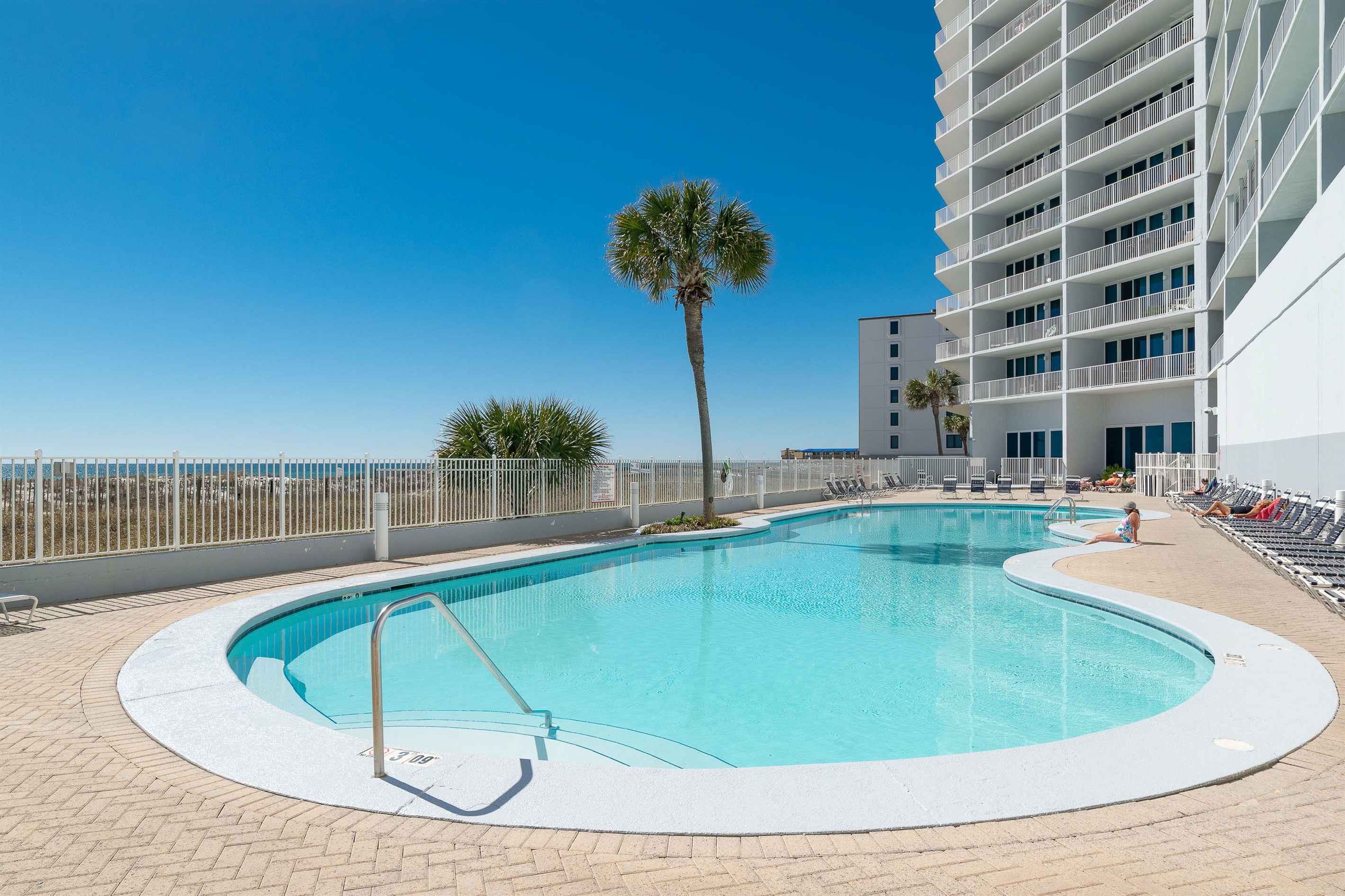 Experience the best of Gulf Shores living. Whether you’re swimming laps or lounging poolside, the white sandy beach is just steps away.