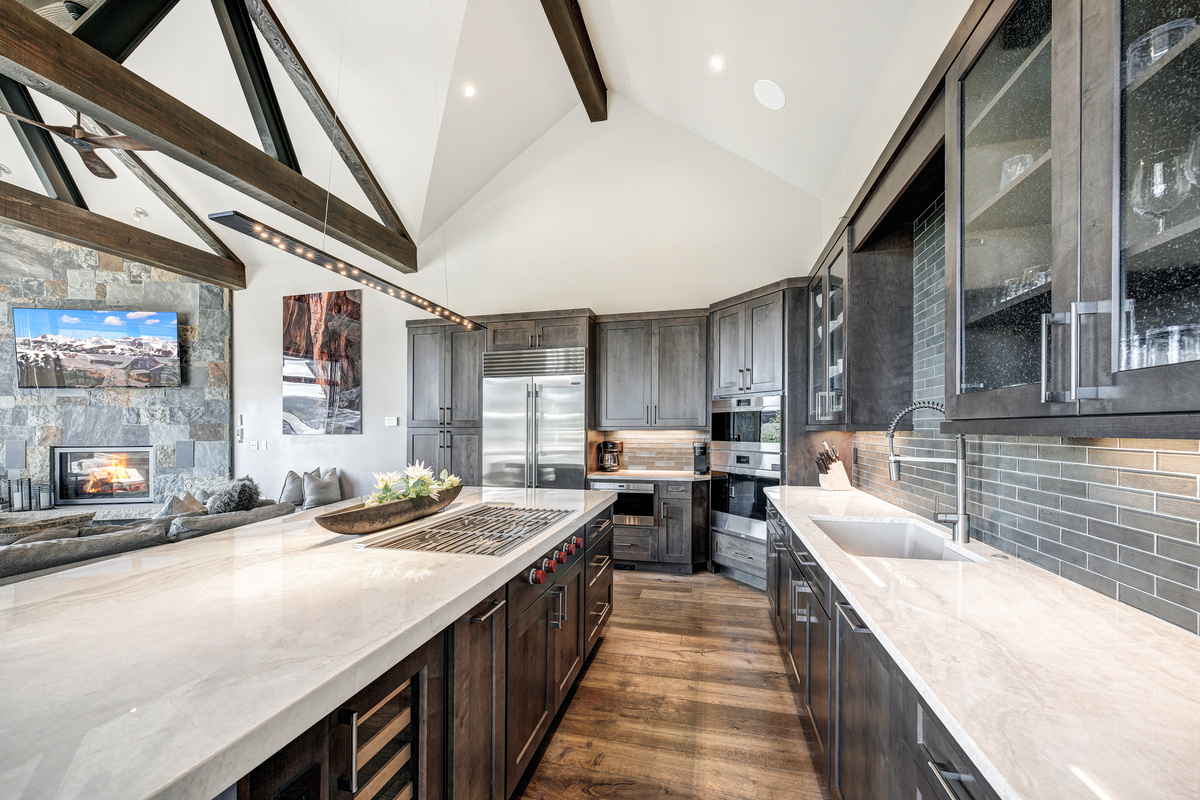 Kitchen with open floor plan to dining room and living room.
