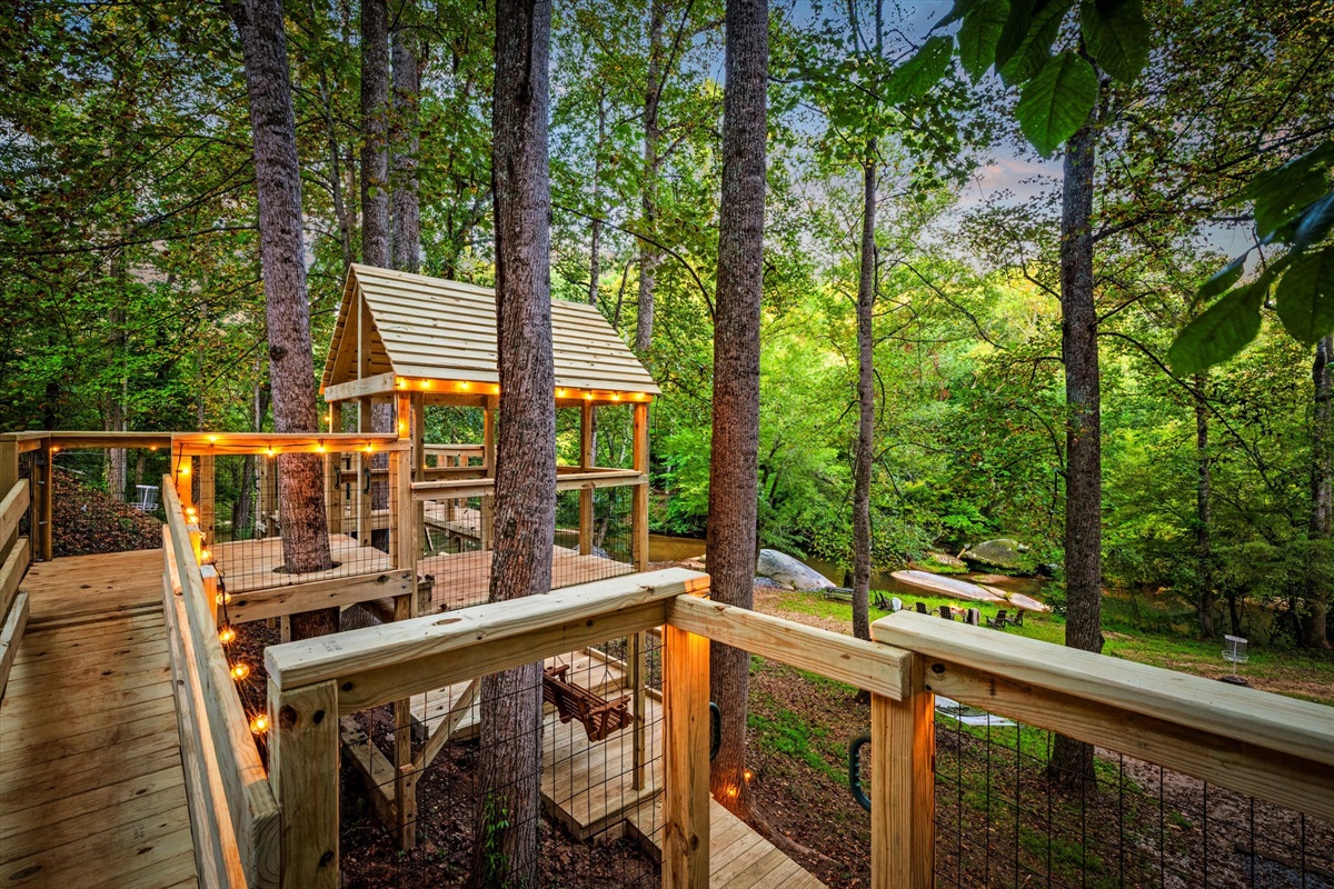 This handcrafted play area lets kids discover their own adventures while parents relax nearby.