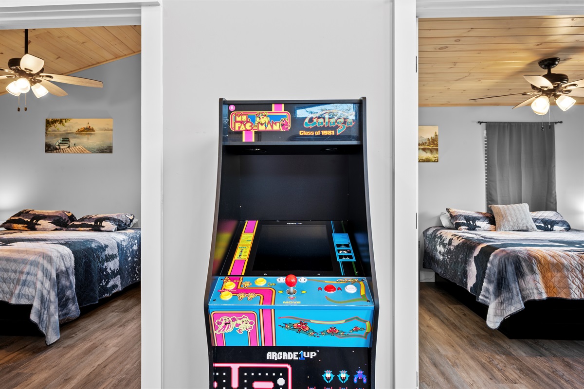 Arcade game conveniently located near sleeping areas and the game room—perfect for quick games and fun breaks throughout the day.