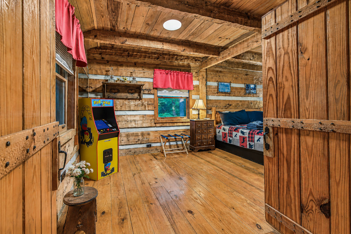 Enjoy a fun game room with a classic Pac-Man arcade.
