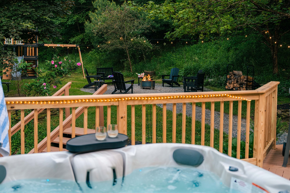 Your private hot tub awaits—perfect for relaxing after a day of exploring the woods.