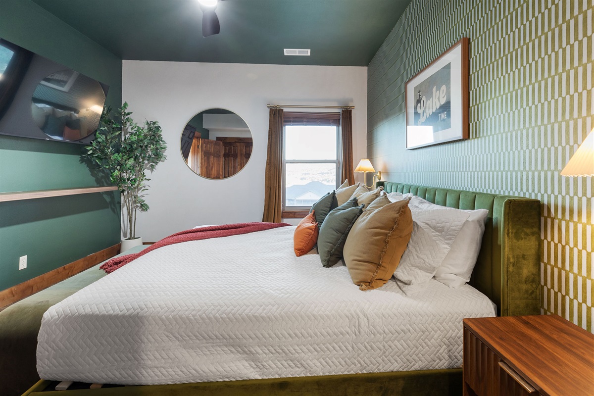 lower level King bedroom that shares jack and jill bath