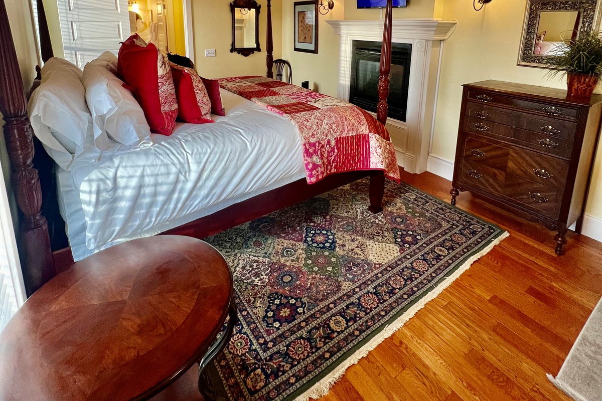 Wake up to garden views in this cozy king bed with historic charm.