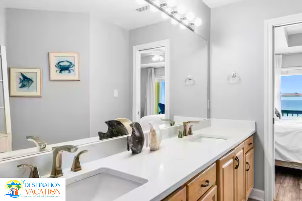 Thoughtful bathroom details add polished coastal charm.