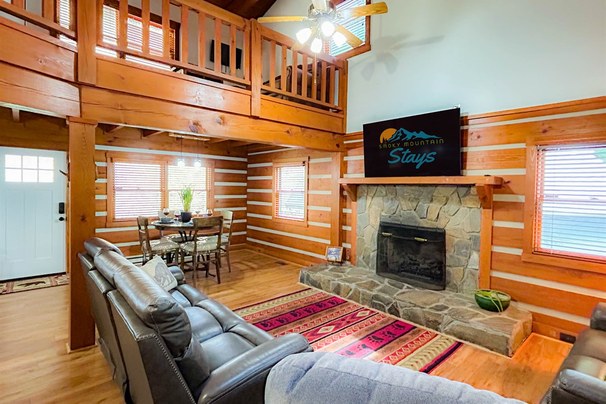 living room area complete with a 70" SmartTV