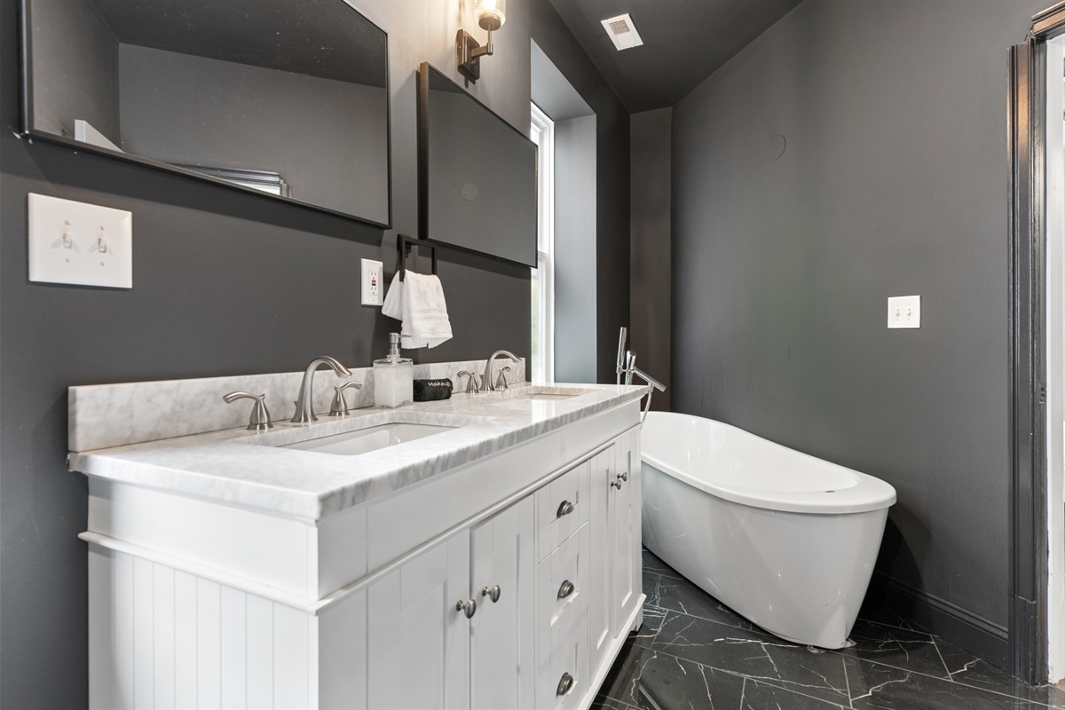 Plenty of space to get ready, featuring luxury finishes and a soaking tub.