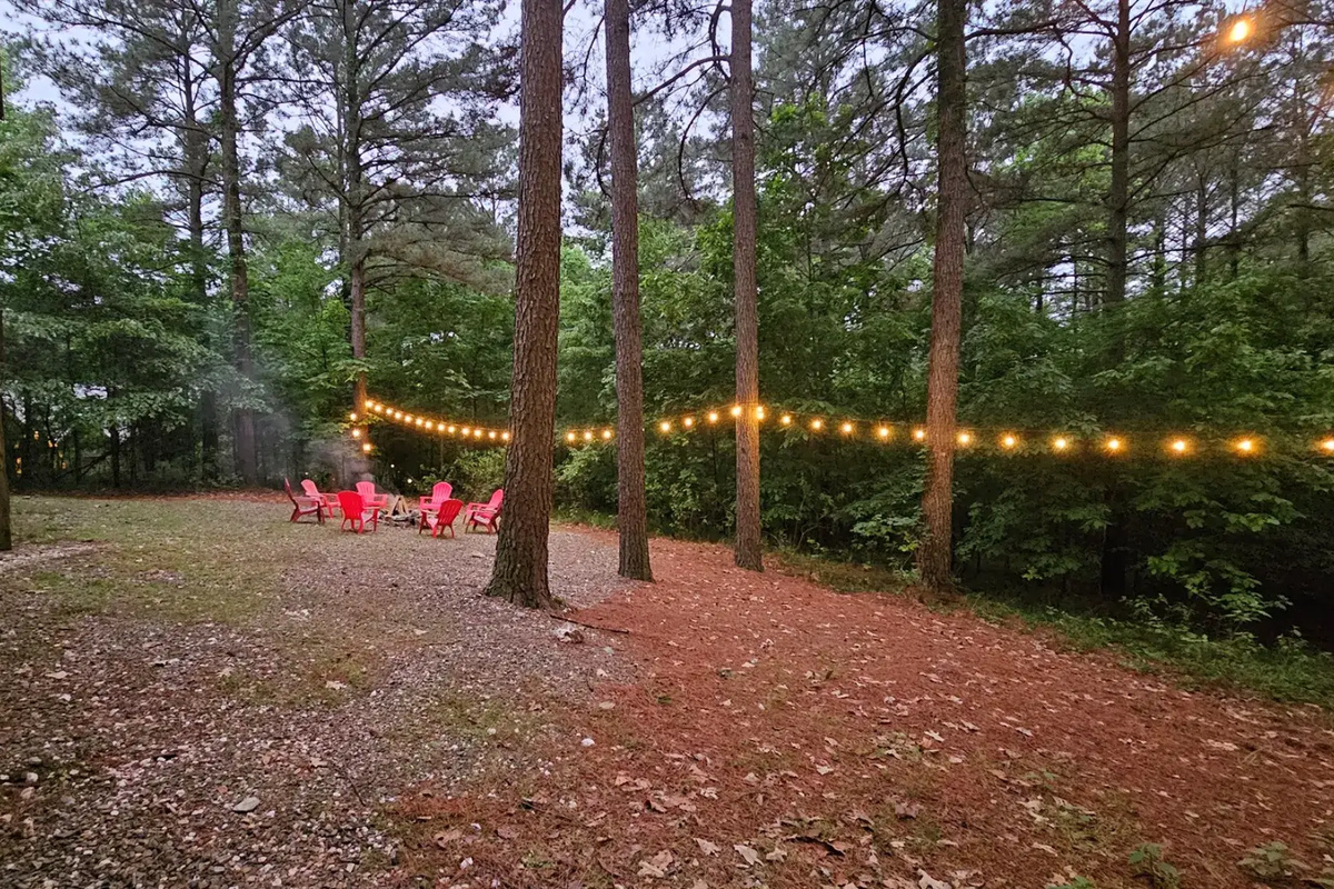 Outdoor Fire Pit: Gather around vibrant chairs for unforgettable evenings under the stars!