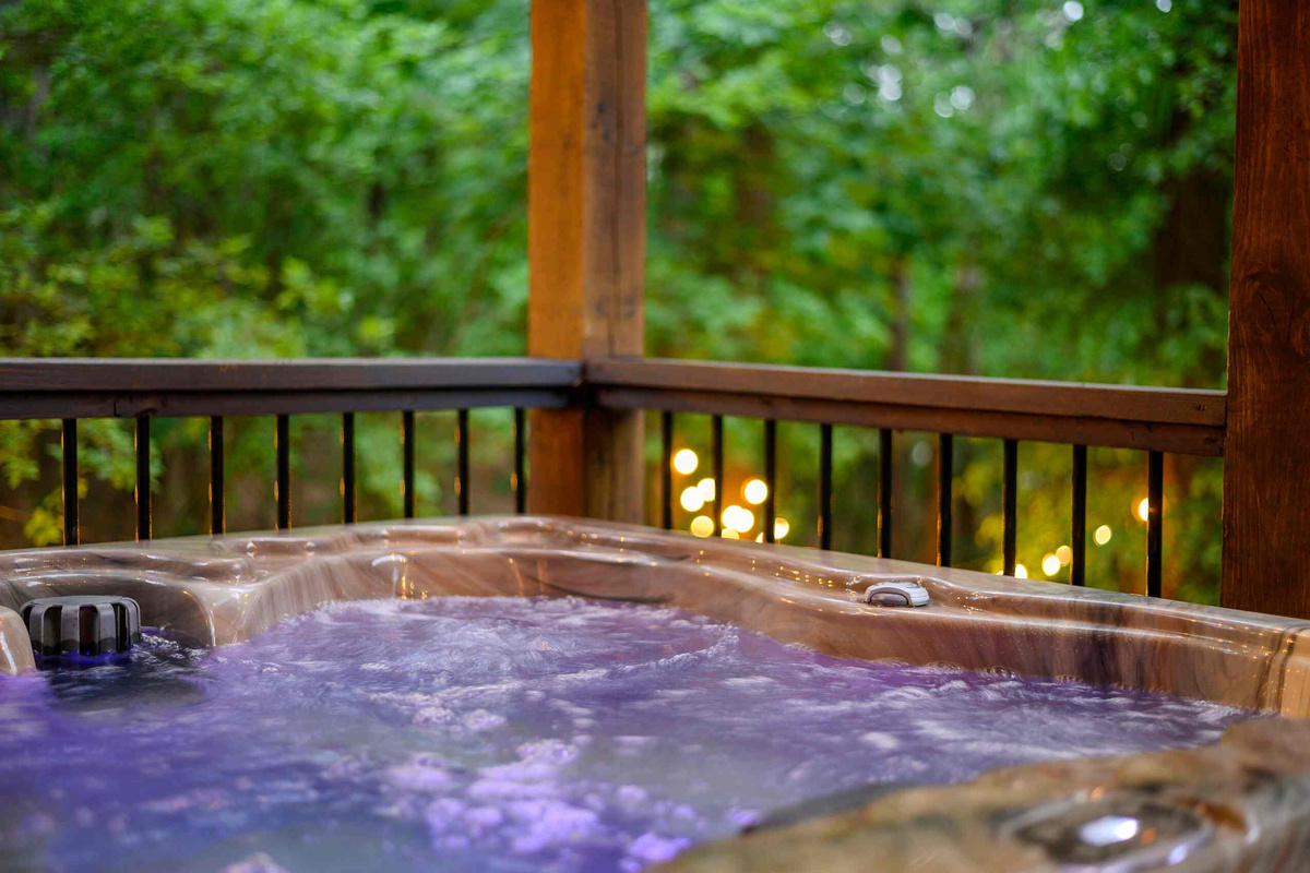 Outdoor Oasis: Dive into relaxation with a bubbling hot tub surrounded by serene nature!