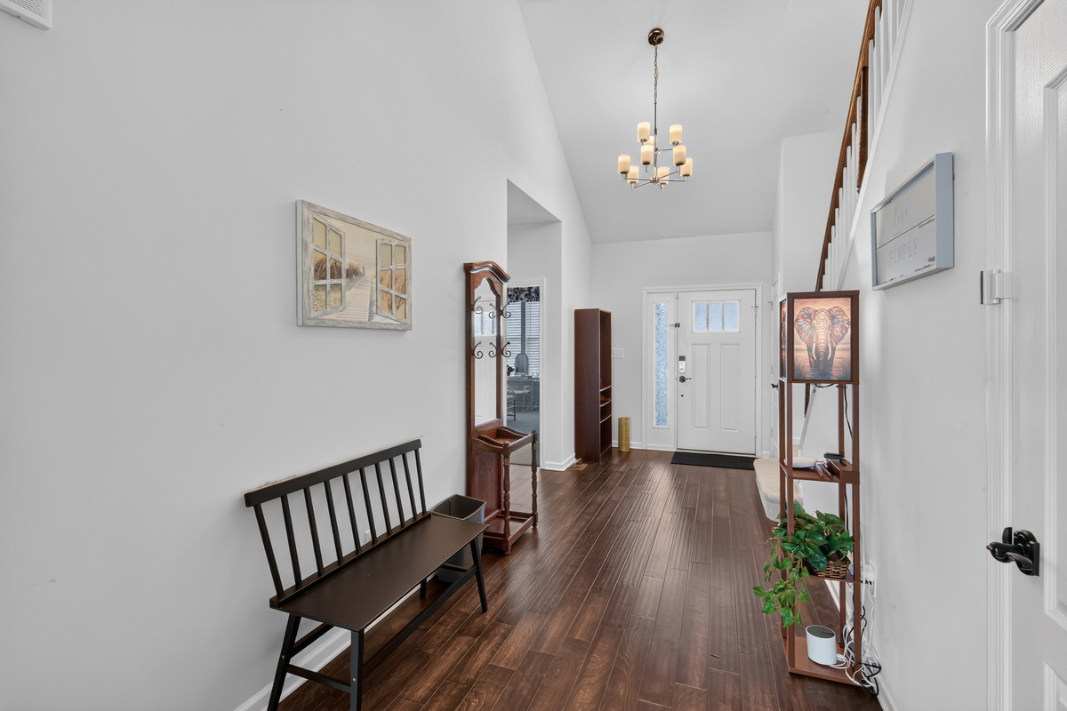 Expansive foyer offers plenty of space to remove and store shoes, coats and umbrellas, promoting a low allergen environment.