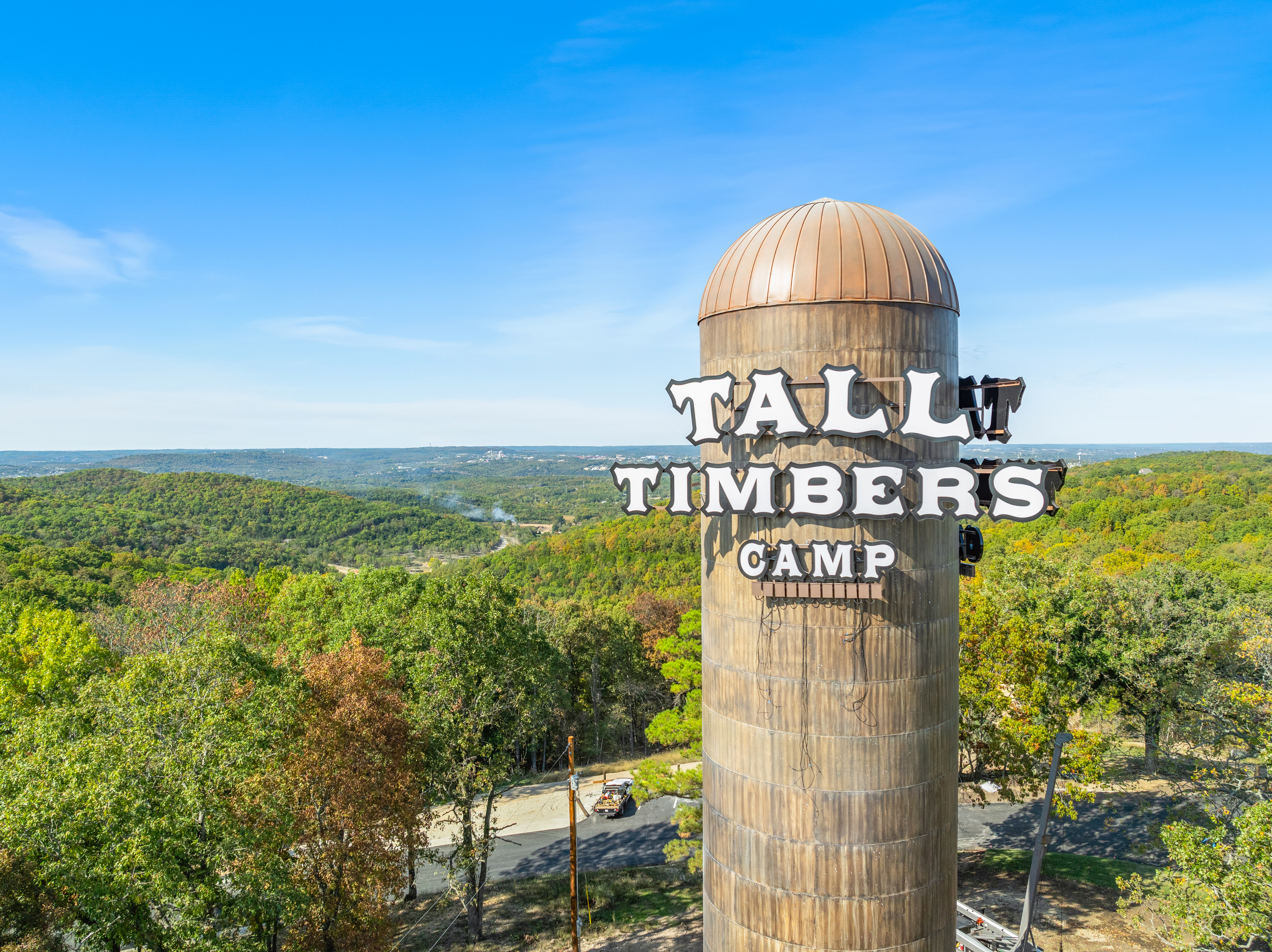 Welcome to Tall Timbers Camp, a landmark water tower rising over the wooded Ozark hills just minutes from Branson.