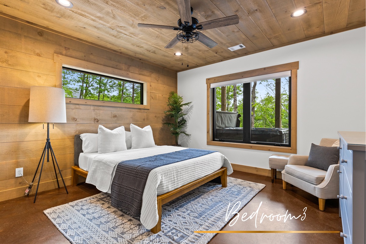 A sky-hued escape surrounded by nature. This queen bedroom is as dreamy as it gets.