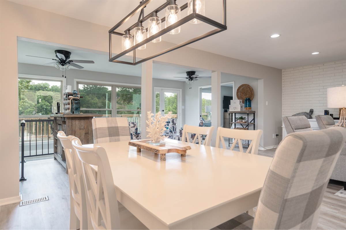 Dining Table with Seating for 8.  Dining Area Open to the Living Room.