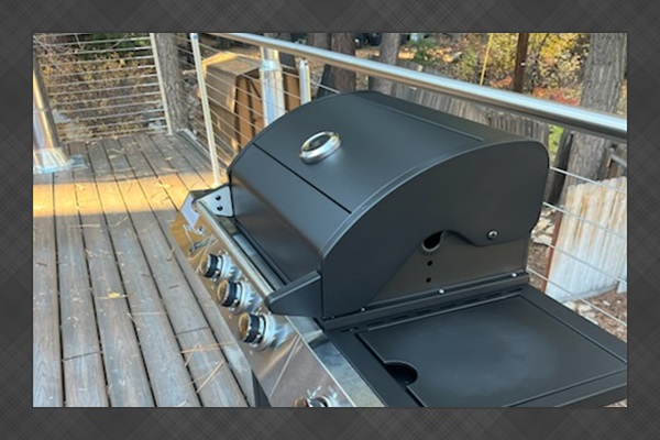 Private outdoor gas grill on mountain cabin deck, perfect for BBQ and outdoor dining
