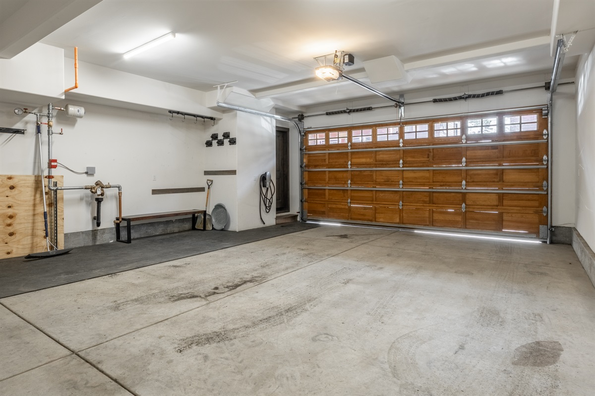 The oversized two-car garage is built for mountain life, with plenty of space for vehicles, gear, and easy coming and going throughout your stay.