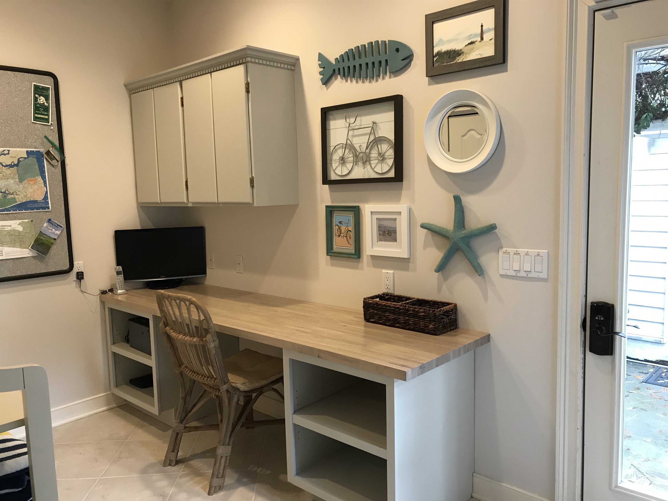 Home office area with monitor and printer provided