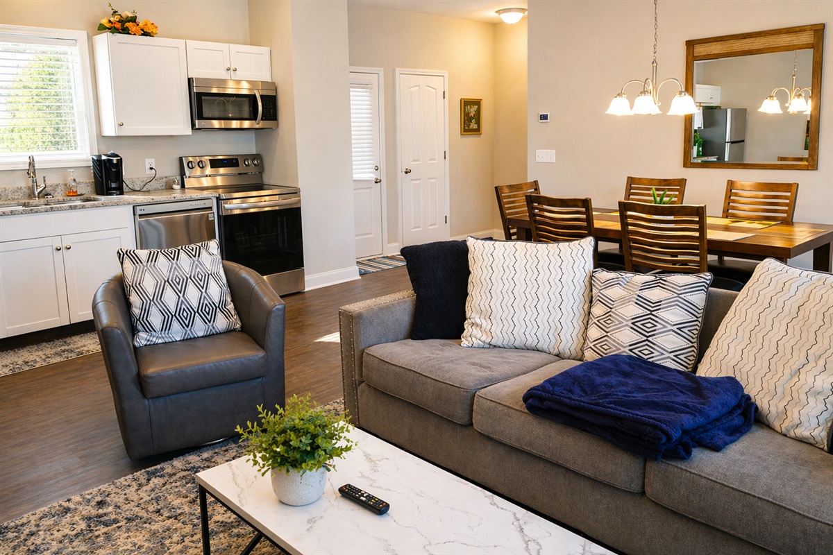 Open-concept living, dining, and kitchen space—perfect for relaxing, cooking, and gathering together.