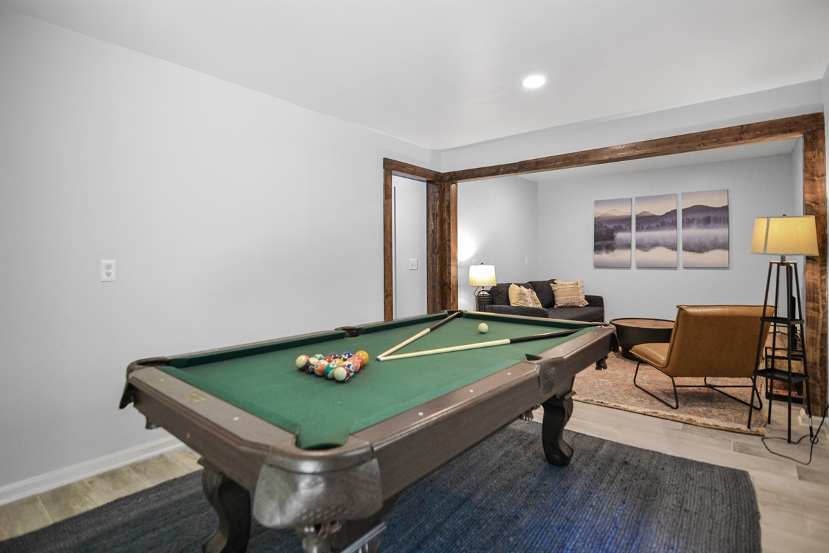 Rec room w/ pool table- basement 