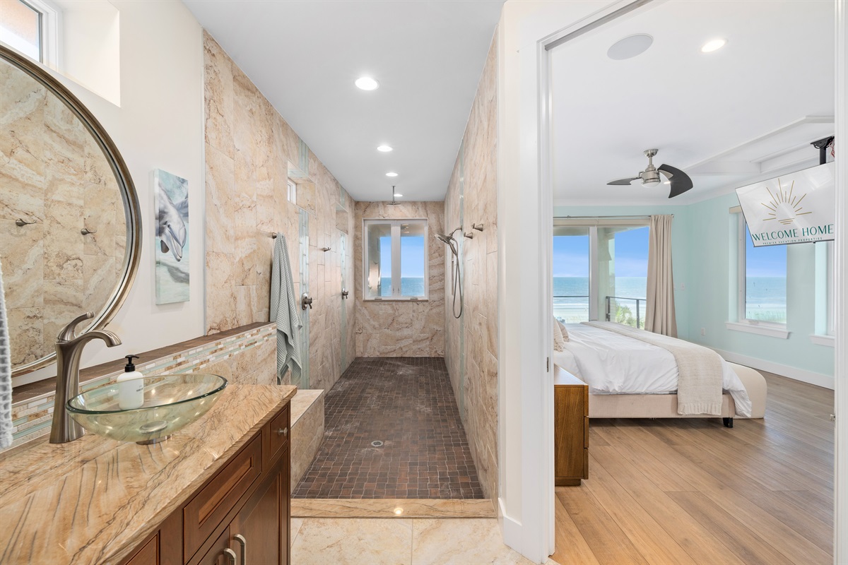 Spa-inspired bathroom with double sinks and large walk-in shower
