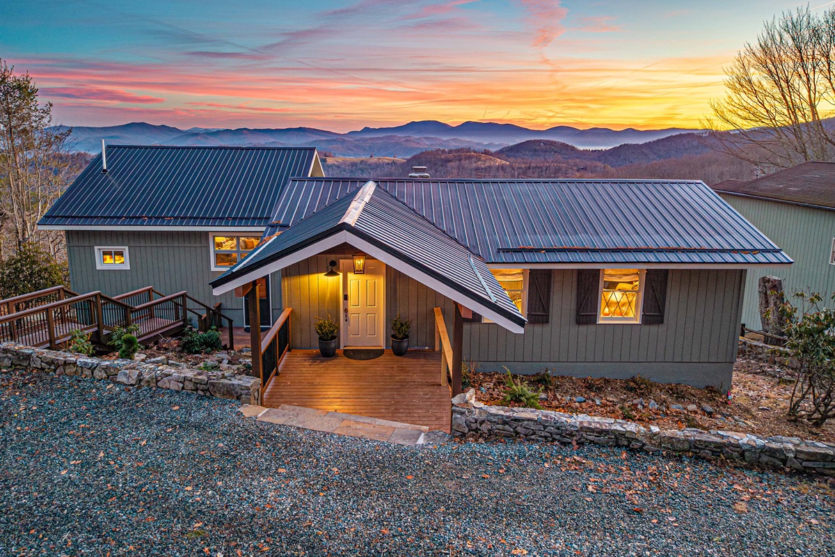 One of two front entrances—this door opens to a spacious entry designed for ski gear, boots, and easy arrivals.