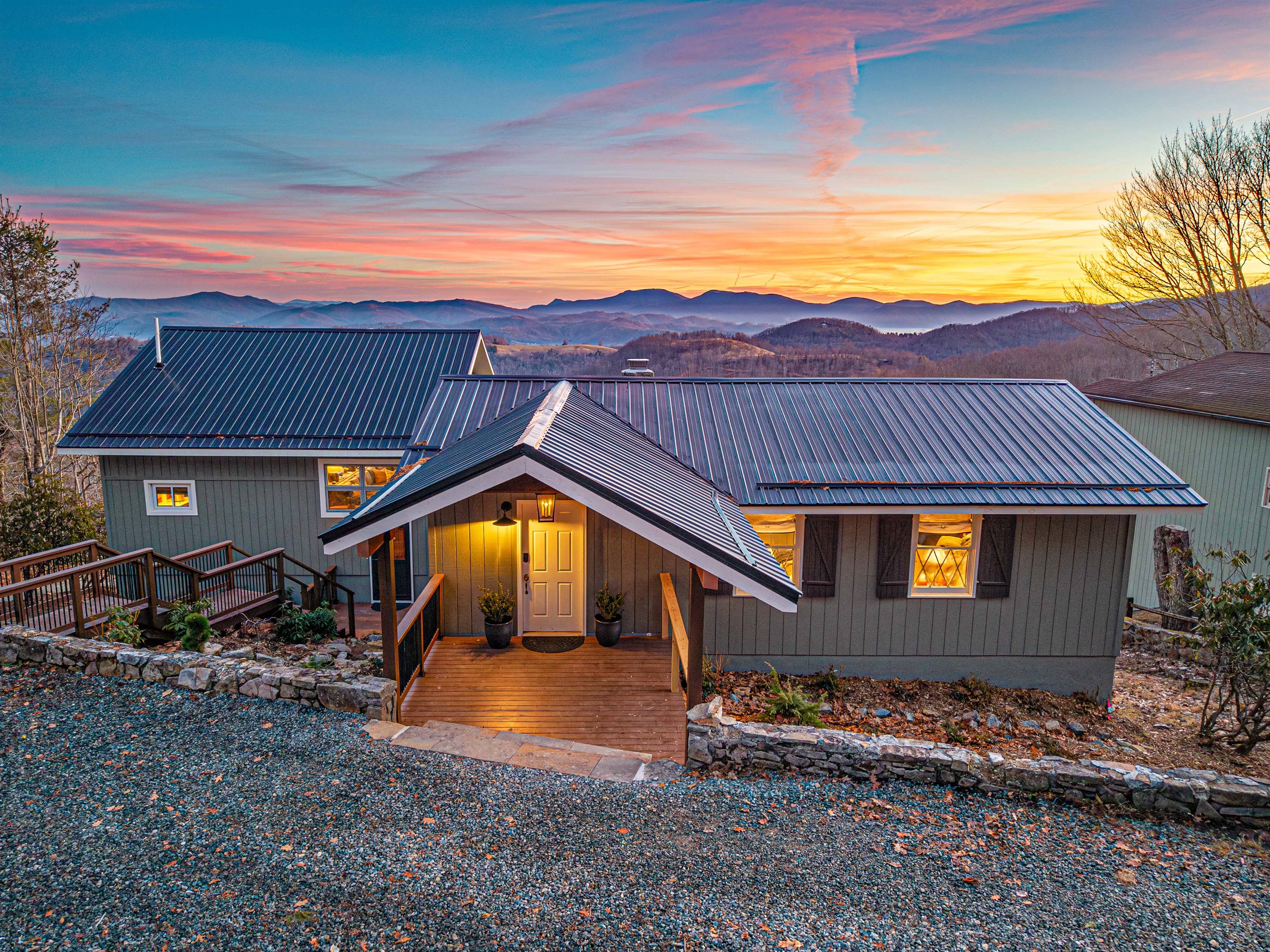 One of two front entrances—this door opens to a spacious entry designed for ski gear, boots, and easy arrivals.