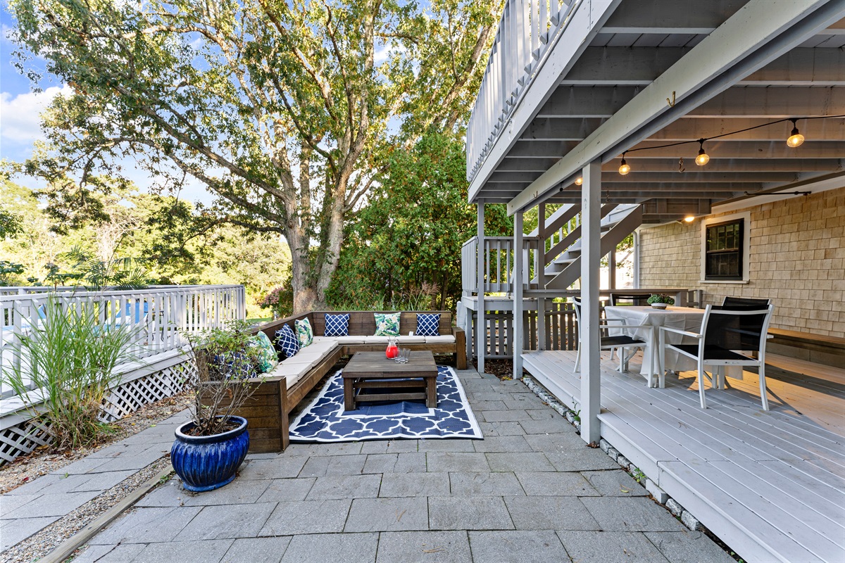 An outdoor sitting area designed for both relaxation and conversation, surrounded by the beauty of nature.