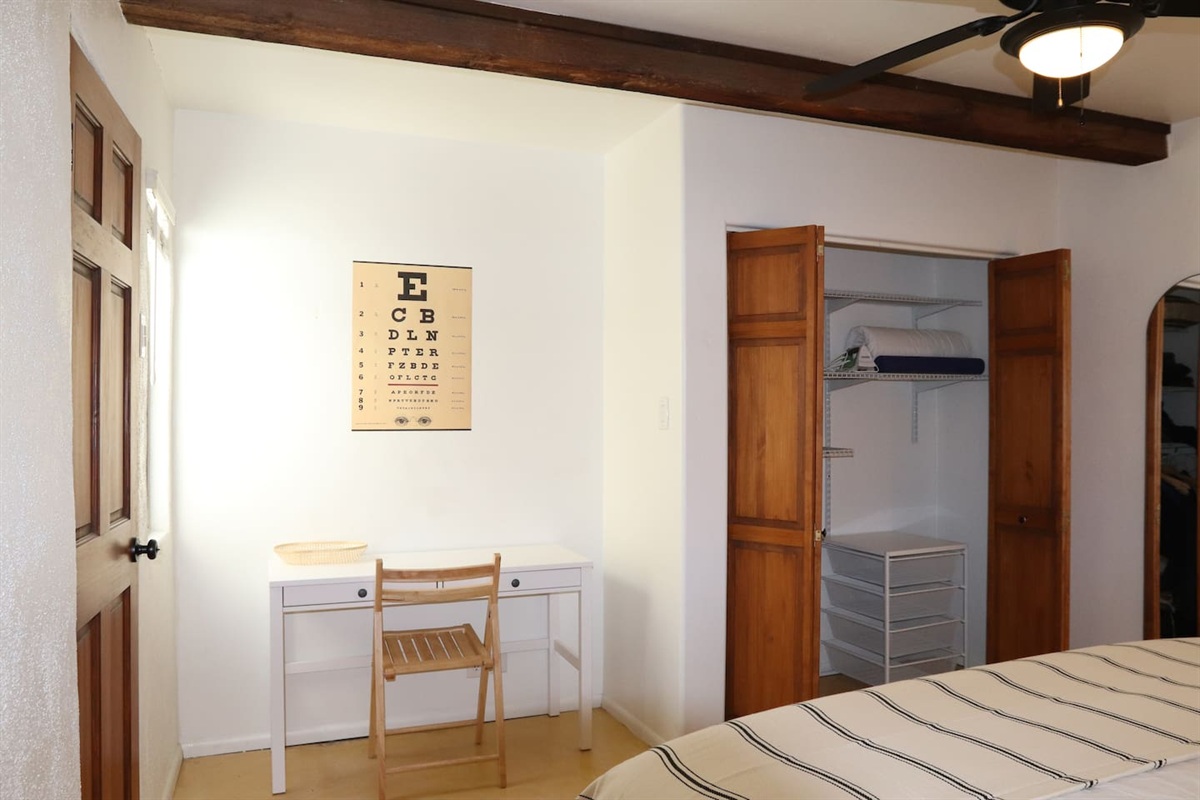 Master bedroom, small desk, closet space