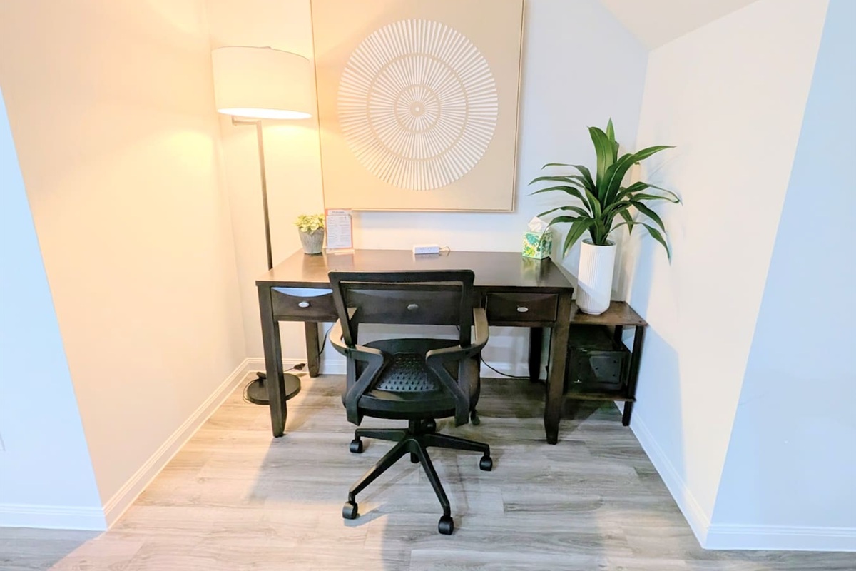 This work space nook includes WiFi access, easy charging ports and a full size desk for your work needs. 