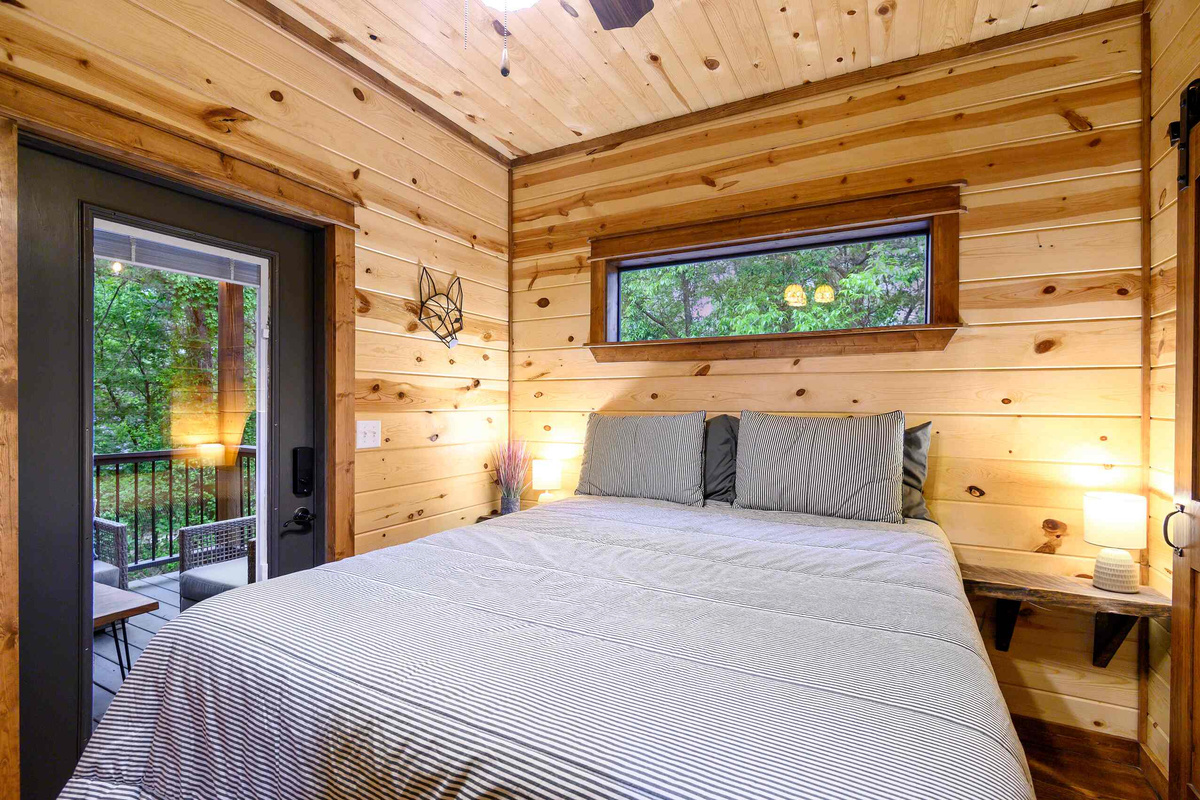 Bedroom Bliss: Escape to this tranquil haven with views that invite nature inside!