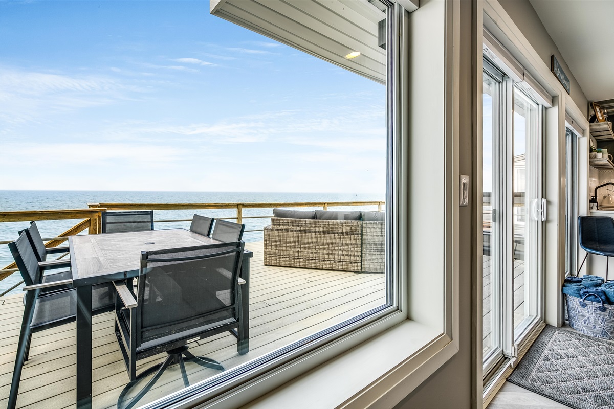 Waterfront deck with outdoor dining for 6.