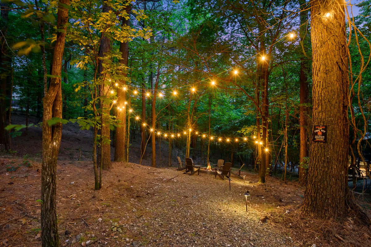Outdoor Retreat: Gather around the fire pit under twinkling lights for unforgettable evenings!