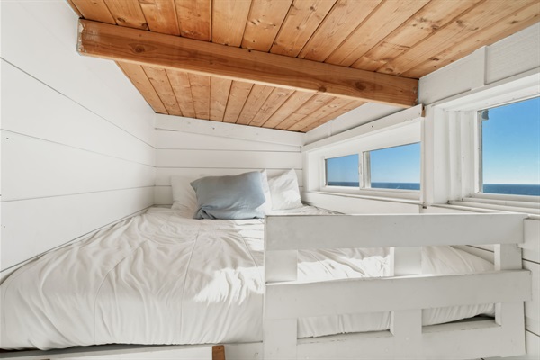 Queen size bed in the “Crows Nest” has one of the best views in the house!