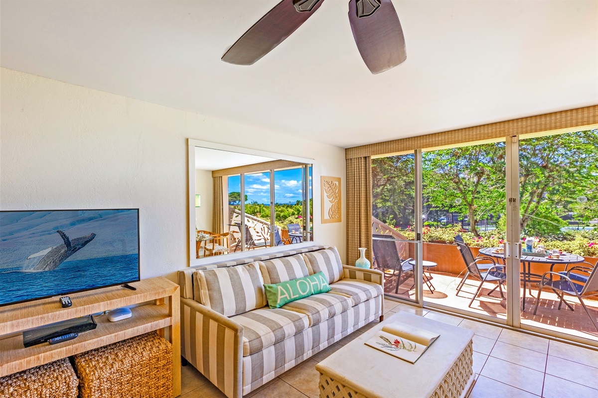 Relax in Style – Plush seating and a flat-screen TV create the perfect spot to unwind after a day at the beach