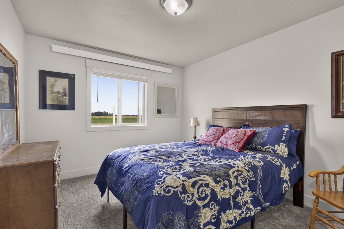 Second bedroom with a queen bed.