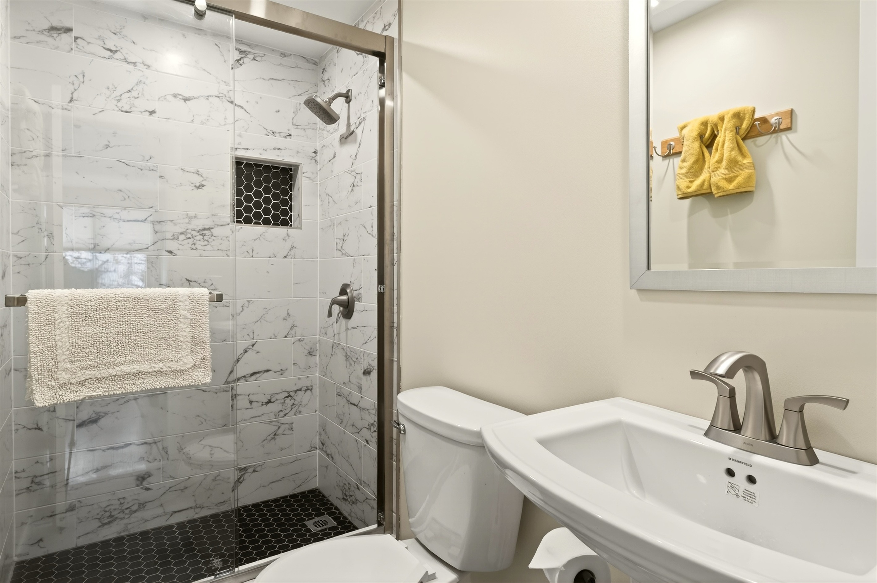 Main floor full bathroom with walk in shower