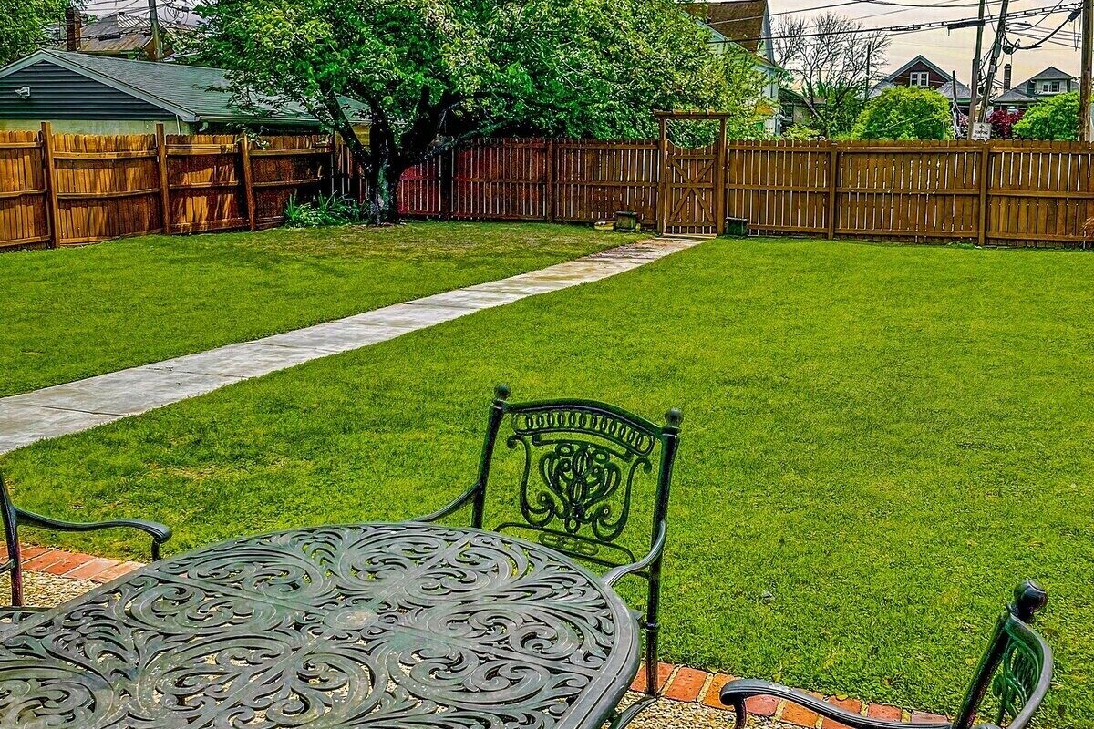 The private fully fenced back yard is the perfect place to enjoy Louisville's Four Seasons. 