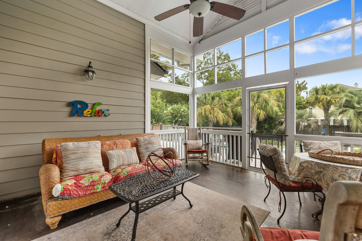 Screened Porch overlooks Pool and Yard