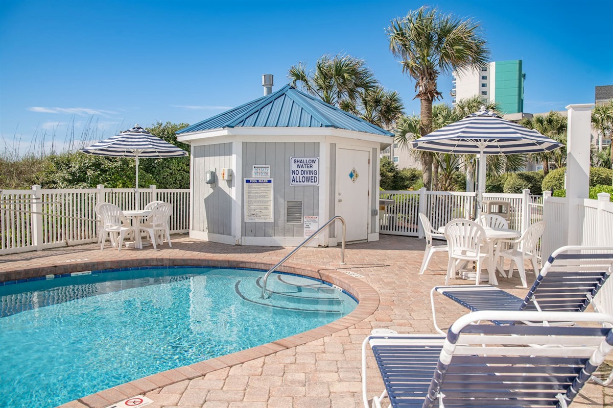 Enjoy the Portofino shared pool.  Ten houses share this beautiful pool located directly in front of Portofino 1424.  The pool deck boasts 4 tables with umbrellas and multiple lounge chairs.  Hi The pool is heated in April, May, September and October 