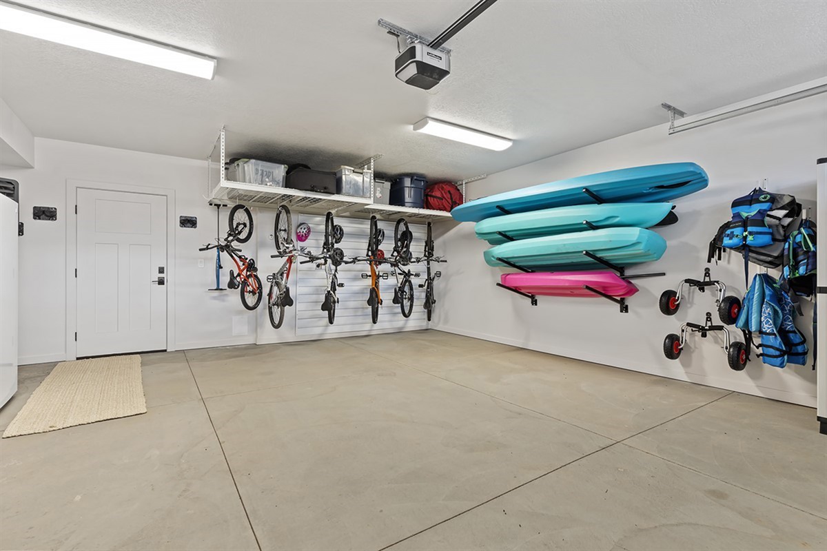 Spacious garage with storage for bikes, kayaks, and all your adventure gear