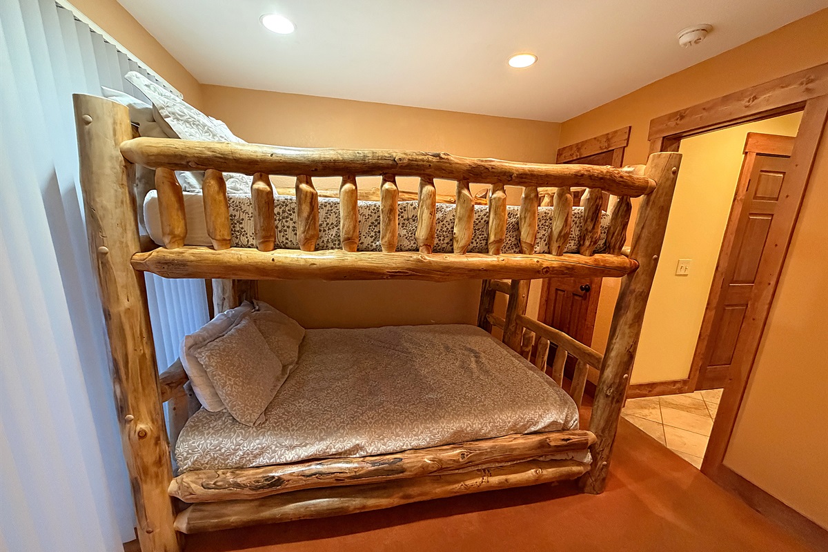 Bedroom #3 with Queen-over-Queen bunk beds and attached bathroom.