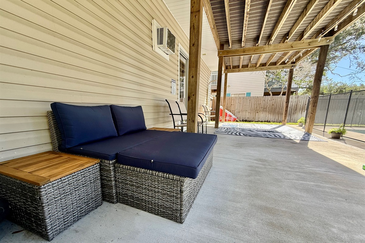 Enjoy the Florida sunshine or retreat to this shaded area for a breezy break between swims.