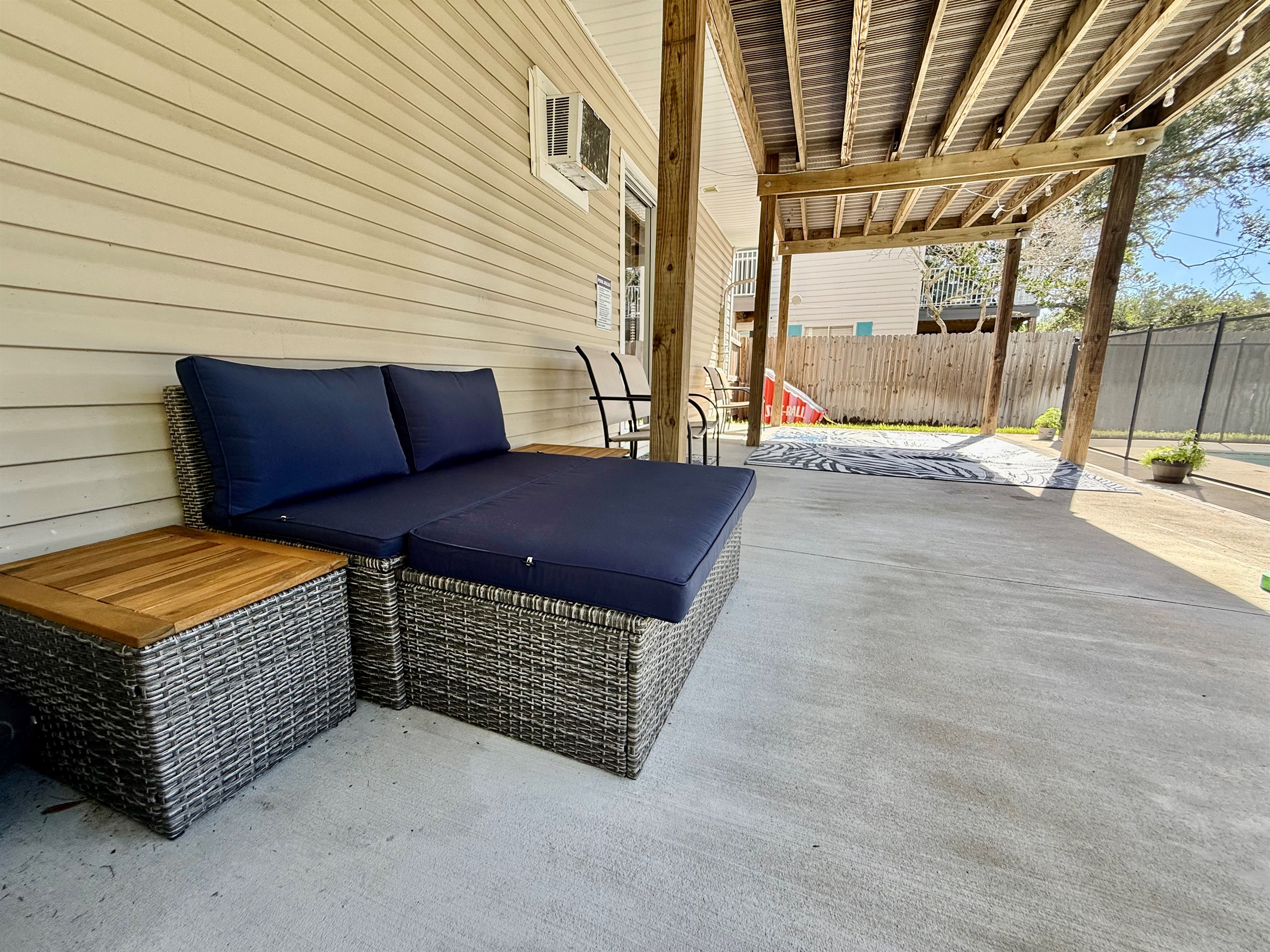 Enjoy the Florida sunshine or retreat to this shaded area for a breezy break between swims.