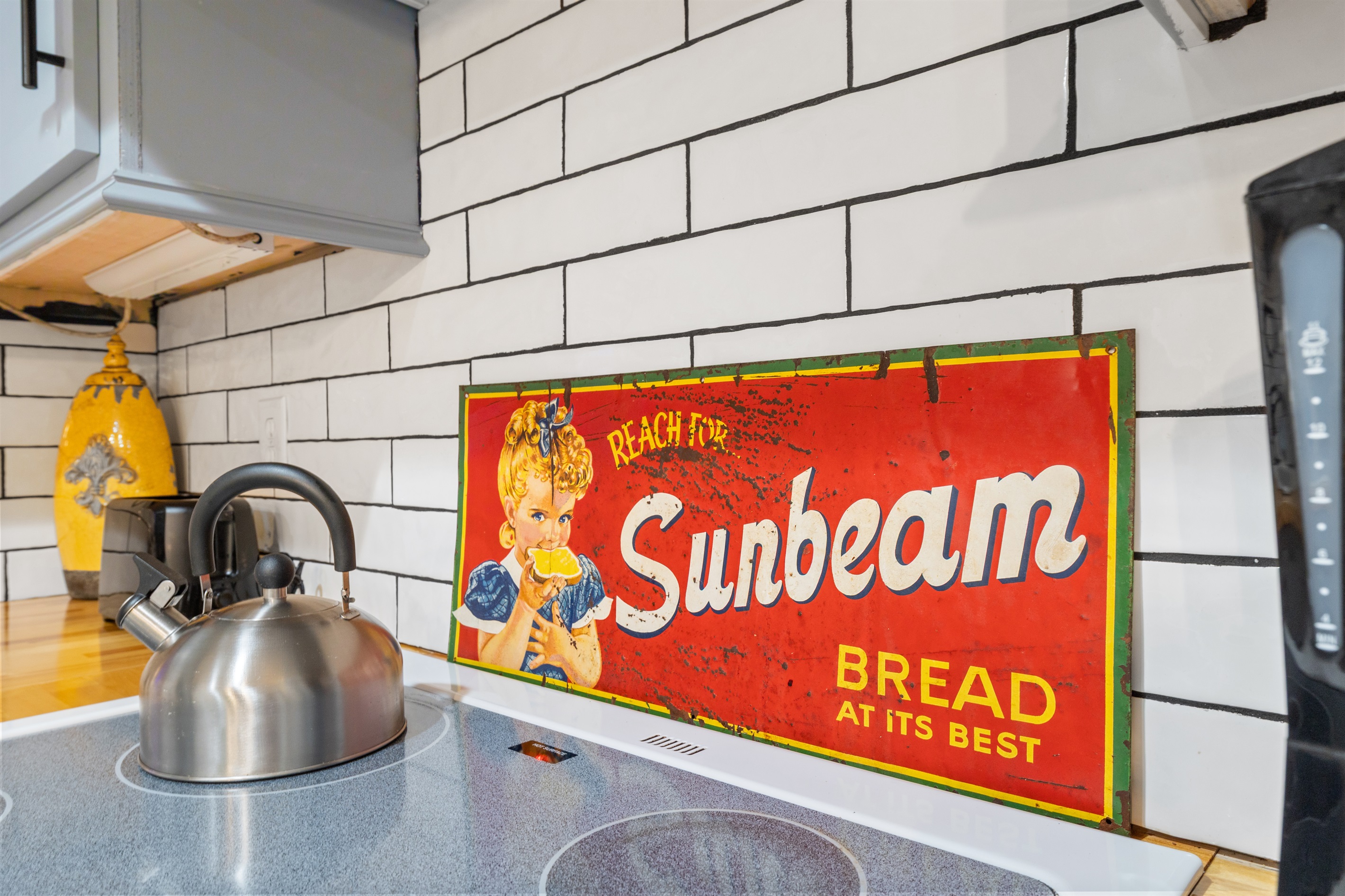 Farmhouse comfort in the little things—like a simple tea kettle waiting to make your stay sweeter.