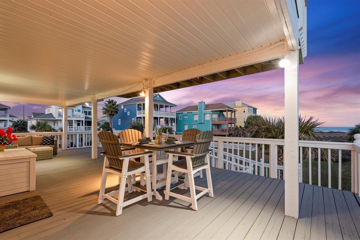 The wrap-around porch creates an ideal setting to savor your morning coffee or indulge in al fresco dining with unimpeded ocean views.