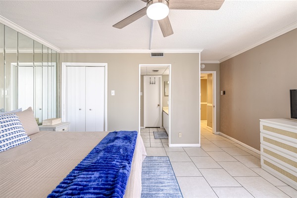 Master bedroom #1 with ensuite bath, ceiling fan, smart TV