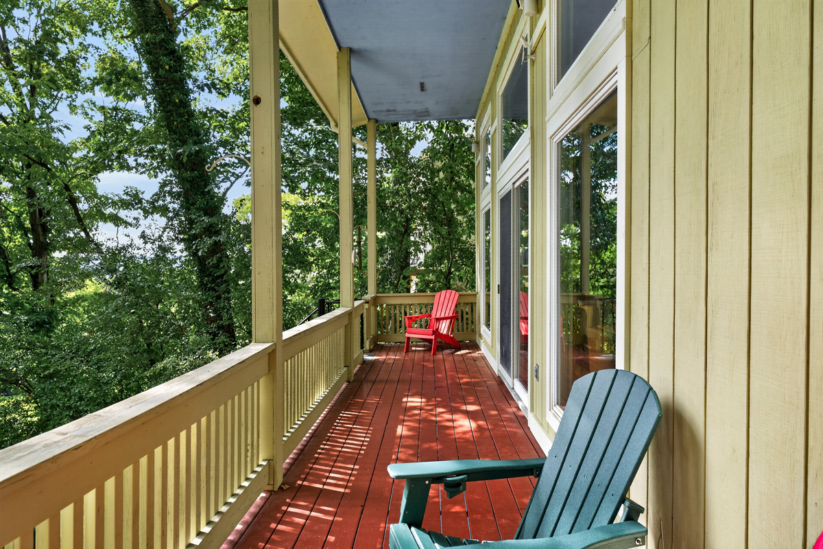 Covered porch with Adirondack chair