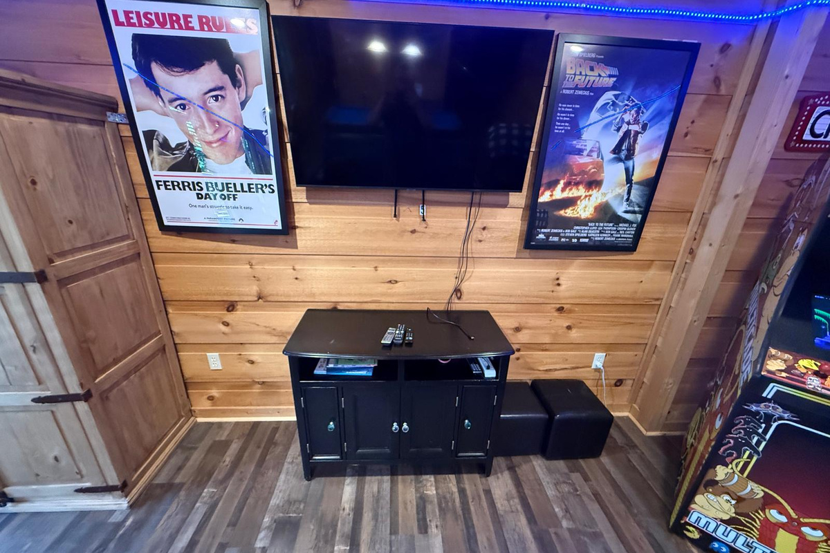 80s Arcade Themed Game Room. Downstairs