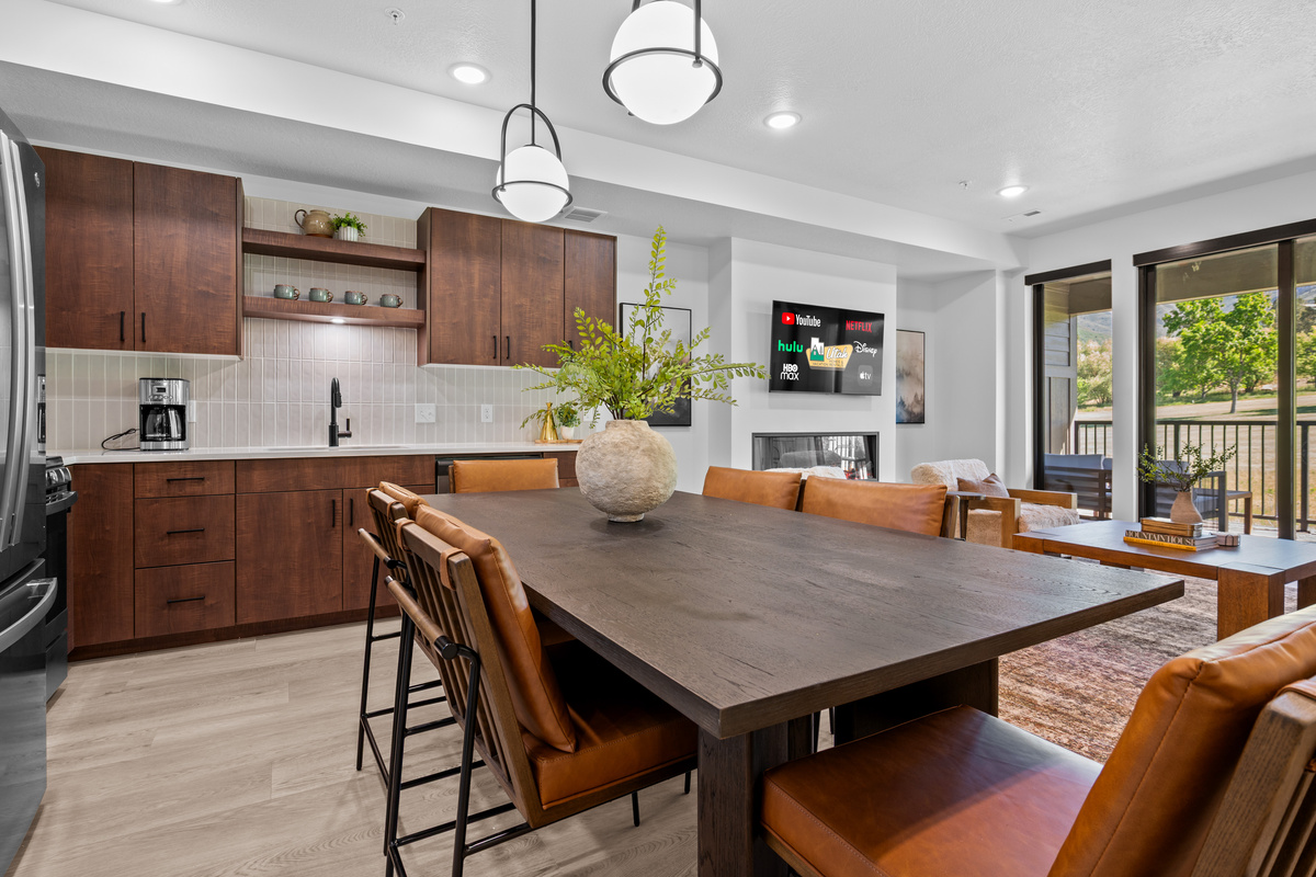 Open kitchen and dining area designed for entertaining and family meals.