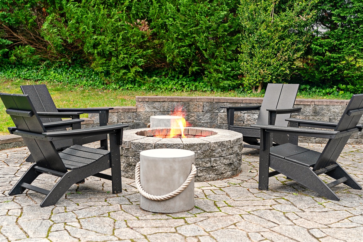 Your perfect spot for evening relaxation — the inviting outdoor firepit.